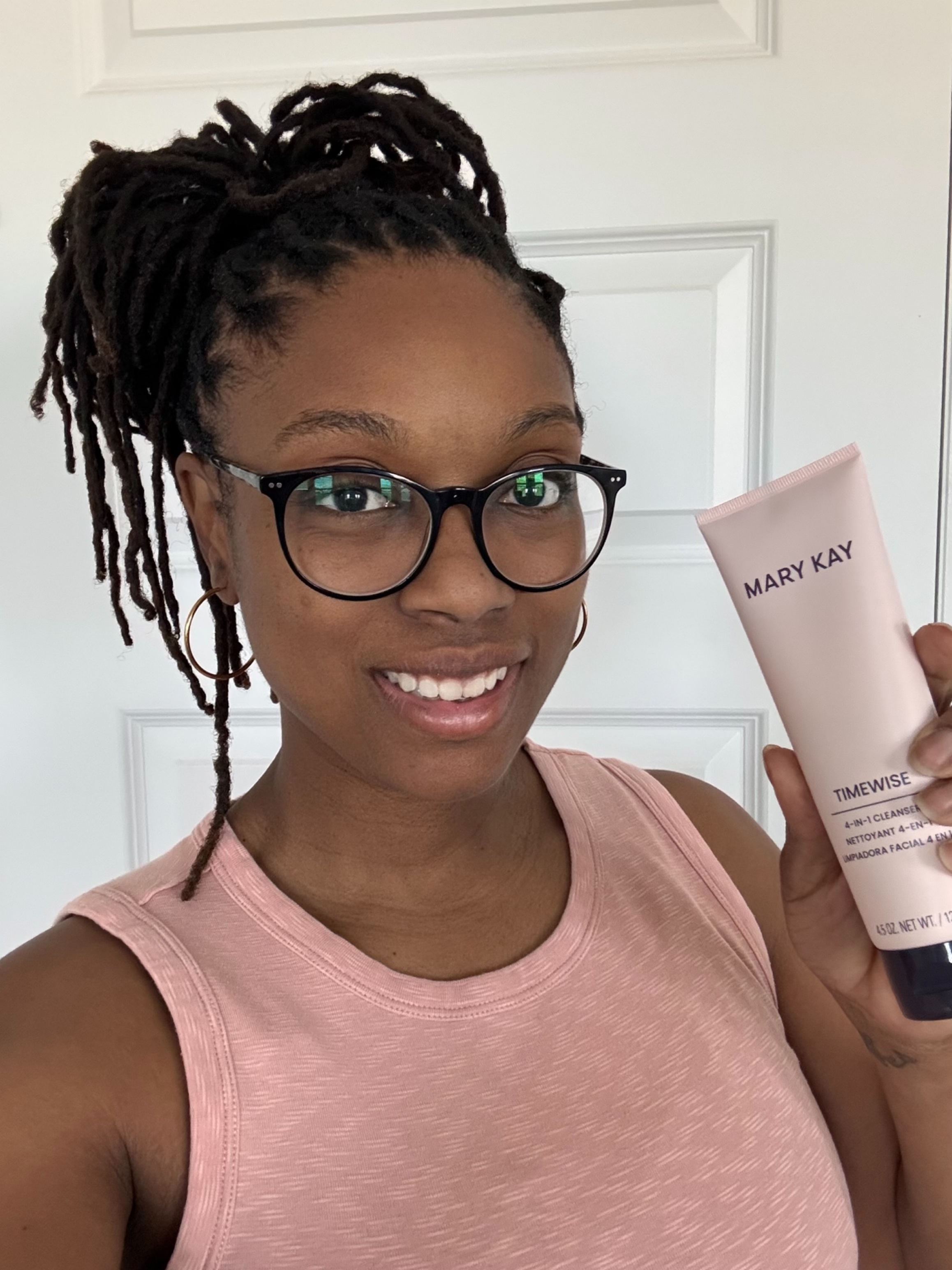 Sonya holding Mary Kay product